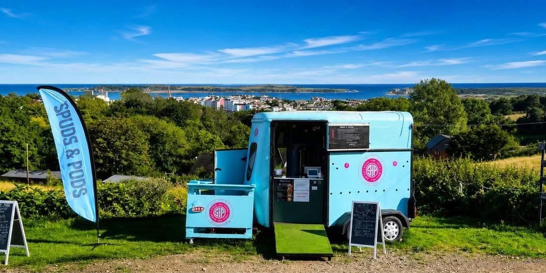 The trailer perched above Tenby, bay in the distance.